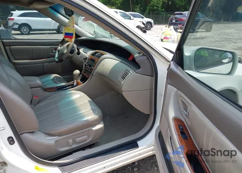 2004 Toyota Avalon Xls z USA, uszkodzony, nr VIN 4T1BF28B44U353750